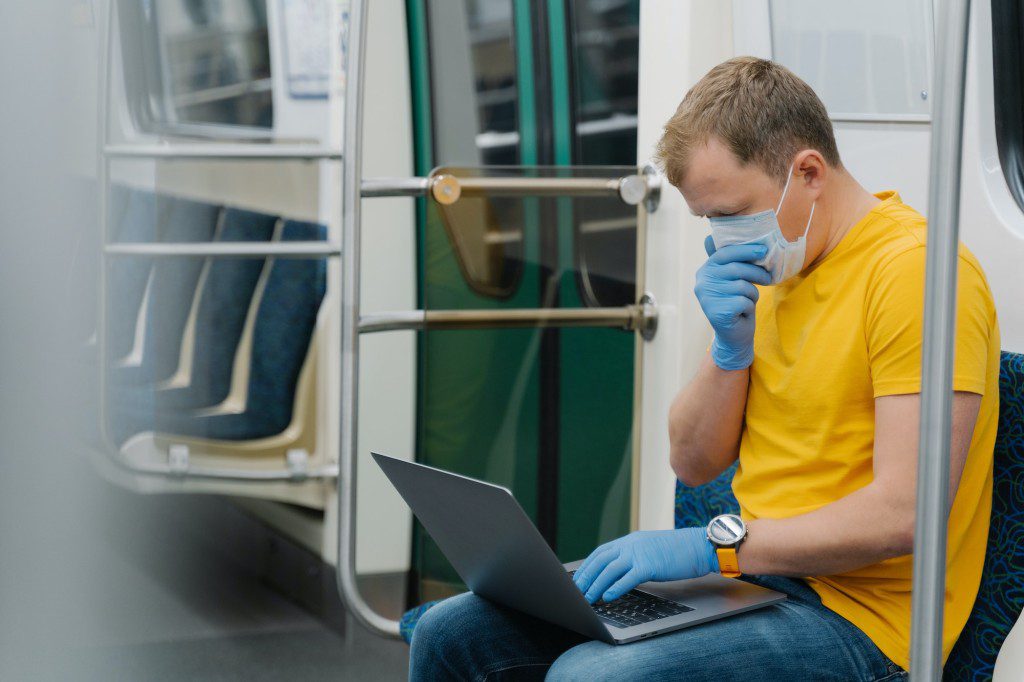 Man passenger coughs and has respiratory disease, travels by public transport