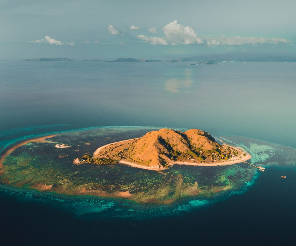 Island among the ocean. Komodo. Aerial drone shot