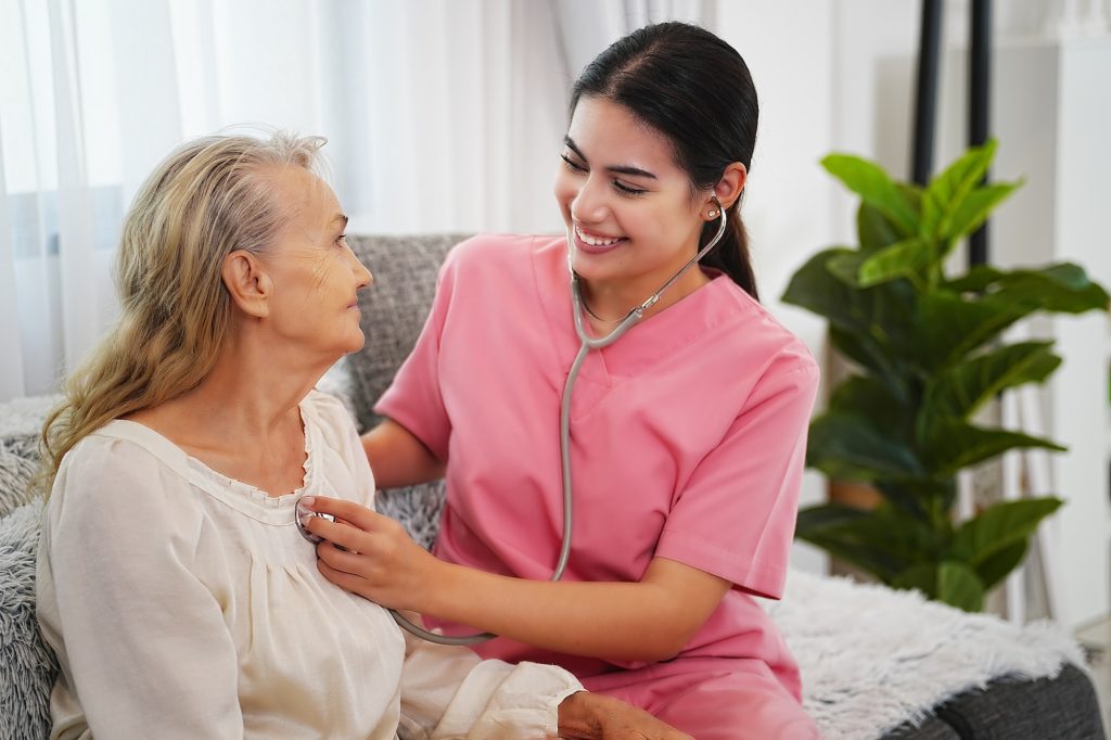 Dementia and Occupational Therapy , Home caregiver and senior adult woman