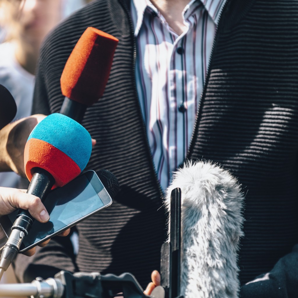 Media Event Outdoors. Journalists Interviewing Male Speaker